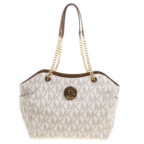 michael kors cream tan purse with pull chain|Michael Kors beige purse.